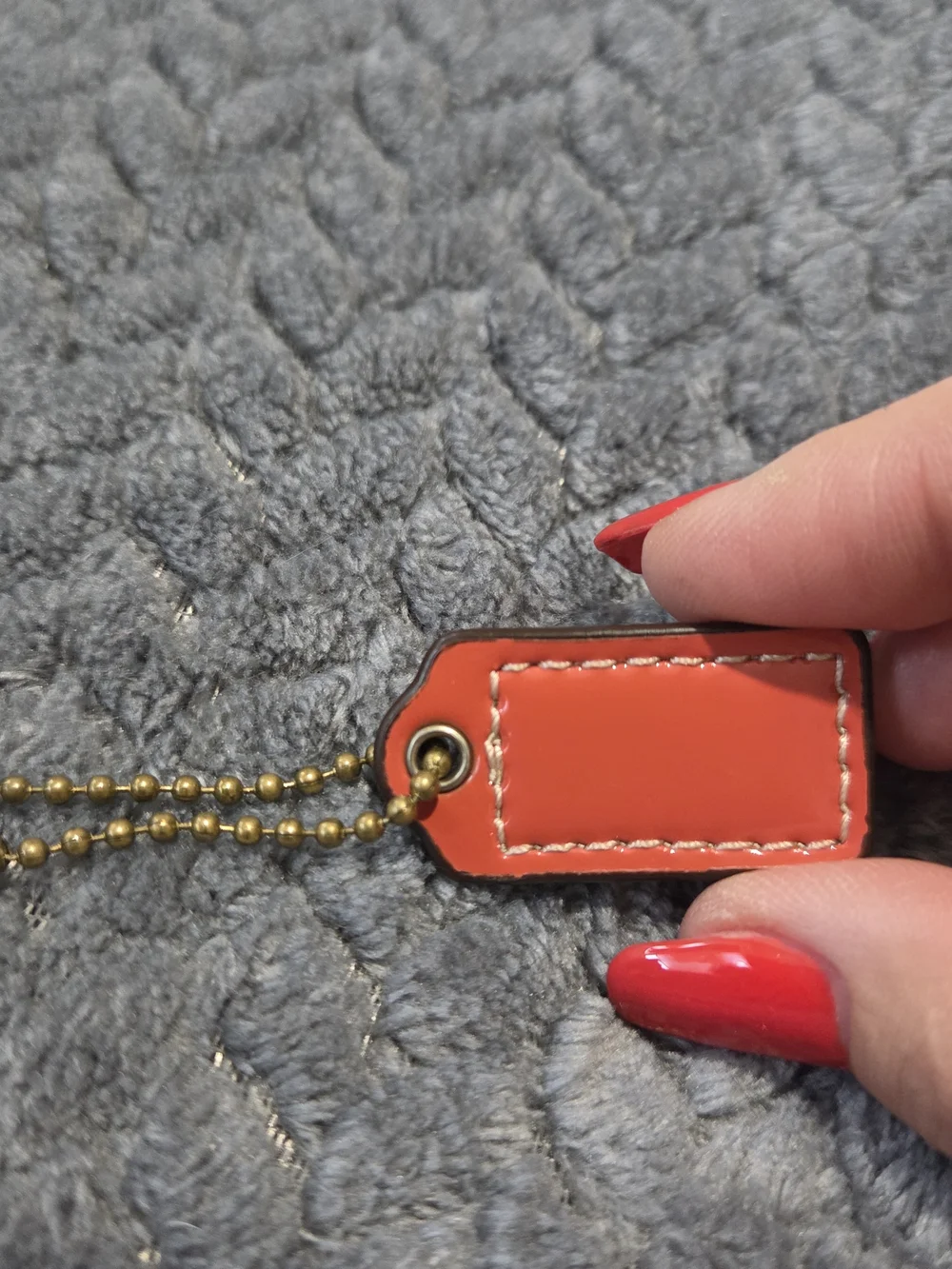 Coach Orange Coral Leather Hangtag And Brass Chain